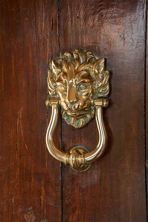 Door knocker with a witch design